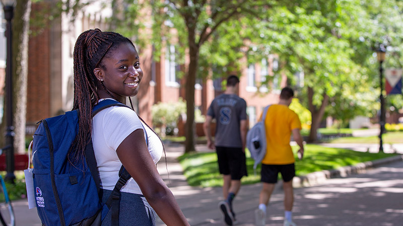Outdoor image of a student smiling